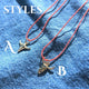 Western-inspired bull skull charm displayed against a white shirt, highlighting its gold finish.